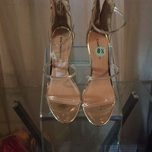 Bebe  clear and gold heels